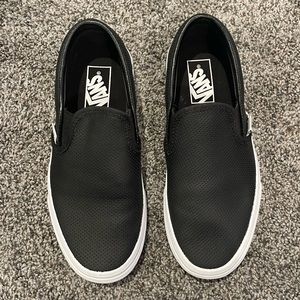 Black leather slip on vans. Size 6.5. Brand new